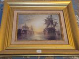 framed picture of a painting of two ships in a body of water