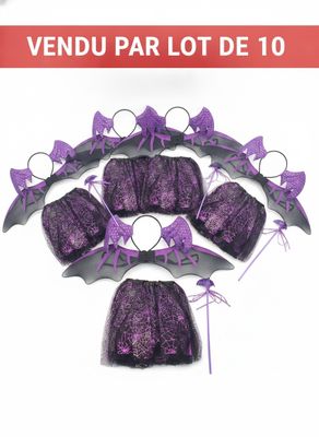 une photo d'un ensemble de combinaisons violettes ornées de nœuds violets