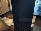 a computer tower sitting on a table in a room