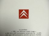 an image of a close up of a book with a red and white logo