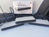 four different types of electronic devices sitting on top of a table