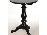an image of a black table with a flower design on it