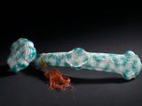 a glass pipe that is sitting on a table