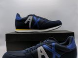 a pair of new balance shoes in a box