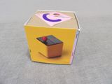 a small box that has a small toy inside of it
