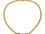 un collier en or et diamants, signé Cartier