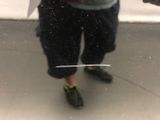 a man standing in front of a mirror holding an umbrella