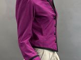an image of a mannequin mannequin wearing a purple jacket and white pants
