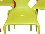 four chairs that are sitting next to each other