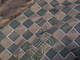 a close up of a piece of fabric with a dog ' s name on it