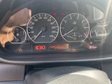 a close up of a car dashboard with various gauges