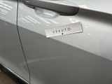 a sticker on the door of a car that says v - auto