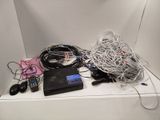 a white box with a bunch of wires on top of it