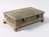 a wooden box that has a design on it