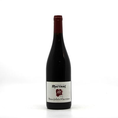 a bottle of wine that is sitting on a table