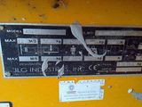 a close up of a sign on the side of a yellow machine
