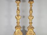 pair of antique brass candlesticks with figures on the bases