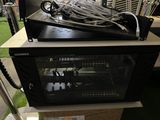 an image of a rack with a bunch of wires in it