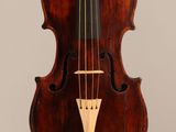 a close up of a violin with a bow on a white background