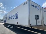 a semi truck that is parked in a parking lot
