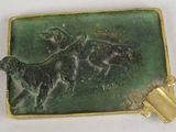 a picture of a plaque with a dog and a cat on it