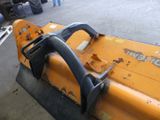 an image of a close up of a fork attachment on a tractor