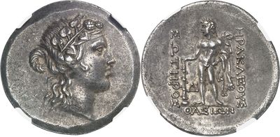 a close up of a silver coin with an image of a woman on it