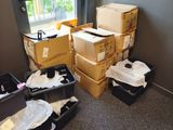 a room with a lot of boxes and boxes on the floor