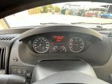 a dashboard of a car with a speedometer and gauges