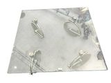 a piece of glass that has a bunch of clips on it