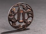 a close up of a small metal object on a table