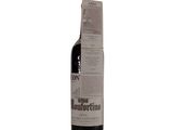 a bottle of wine that is sitting on a table