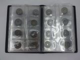 a lot of different types of coins in a case