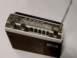 a radio that is sitting on a white table