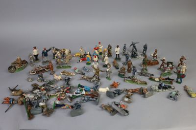 a lot of figurines that are sitting on a table