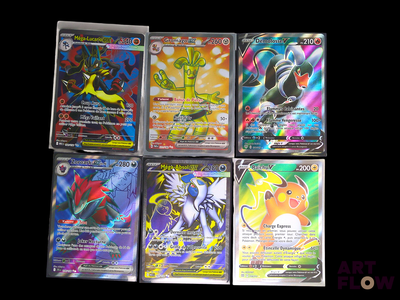 a lot of different types of pokemon cards in a box