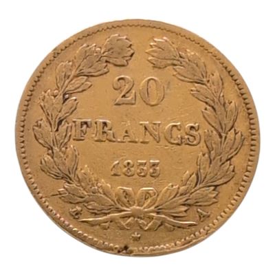 gros plan d'une pièce de monnaie sur une surface blanche