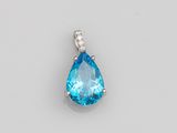 a blue topaz quartz and diamond pendant