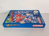 the box for the nintendo game mega man 5 is sitting on a table