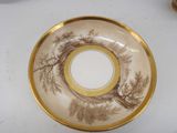 a plate with a picture of a tree on it