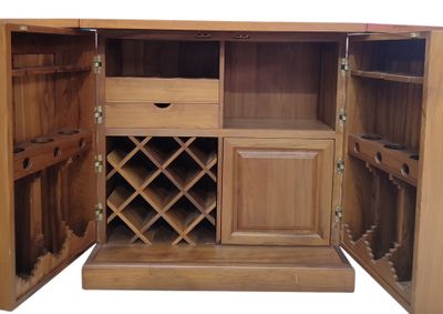 a wooden cabinet with a wine rack inside of it