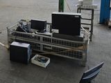 a metal cart with a bunch of computer equipment on it