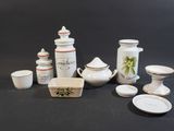 a lot of white and red items on a black table