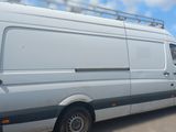 a white van that is parked in a parking lot