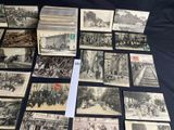 several old black and white photographs of people and buildings