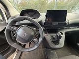 the interior of a car with a steering wheel, dashboard, and dash board