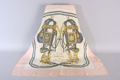 a scarf with a picture of a couple of horses on it
