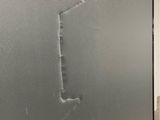 a frosted glass door with a drawing of a man on it