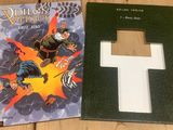 the front and back covers of a comic book with a cross on it