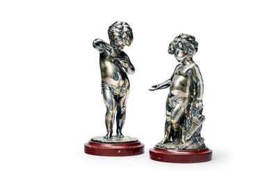 paire de figurines anciennes en argent représentant un garçon et une fille